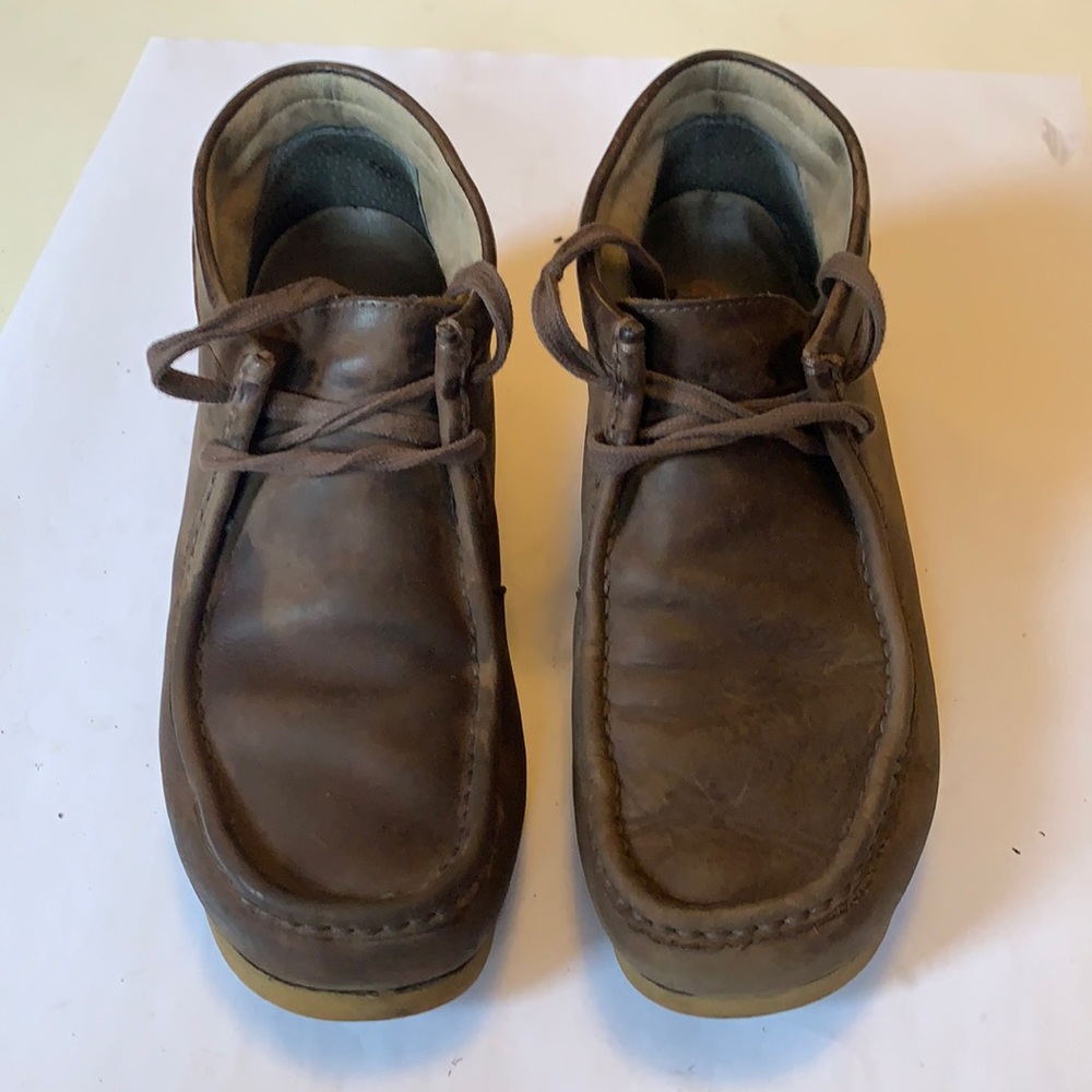 Brown suede Clarks wallabees.